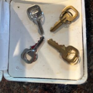 Louis Vuitton Silver or  Gold Key for classic padlocks. 100% authentic